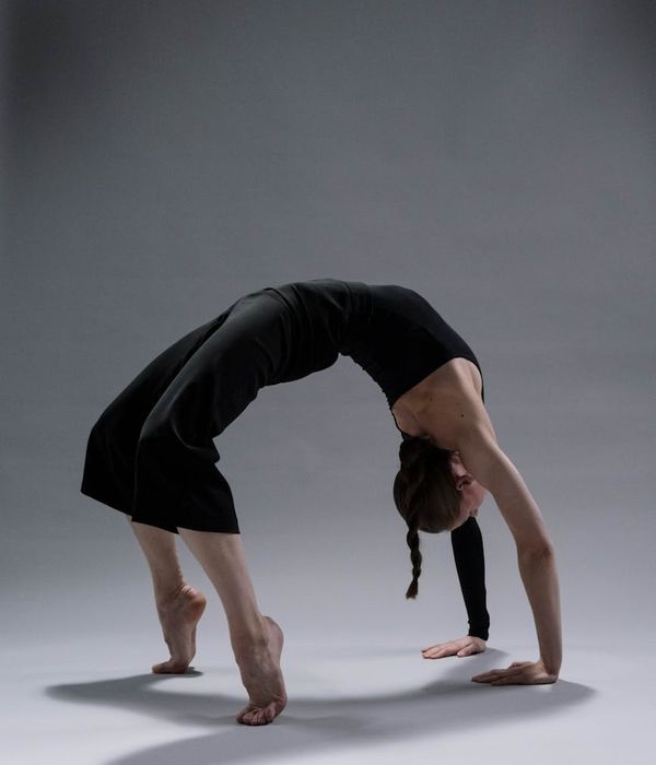 Person practicing gentle yoga movements for balance and coordination